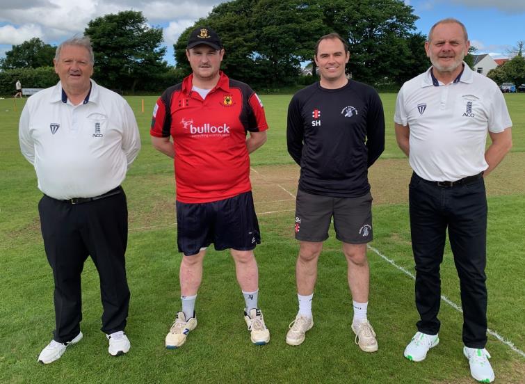 Umpires Chris Stapleton and Jon Willington with Rhys Davies and Sean Hannon